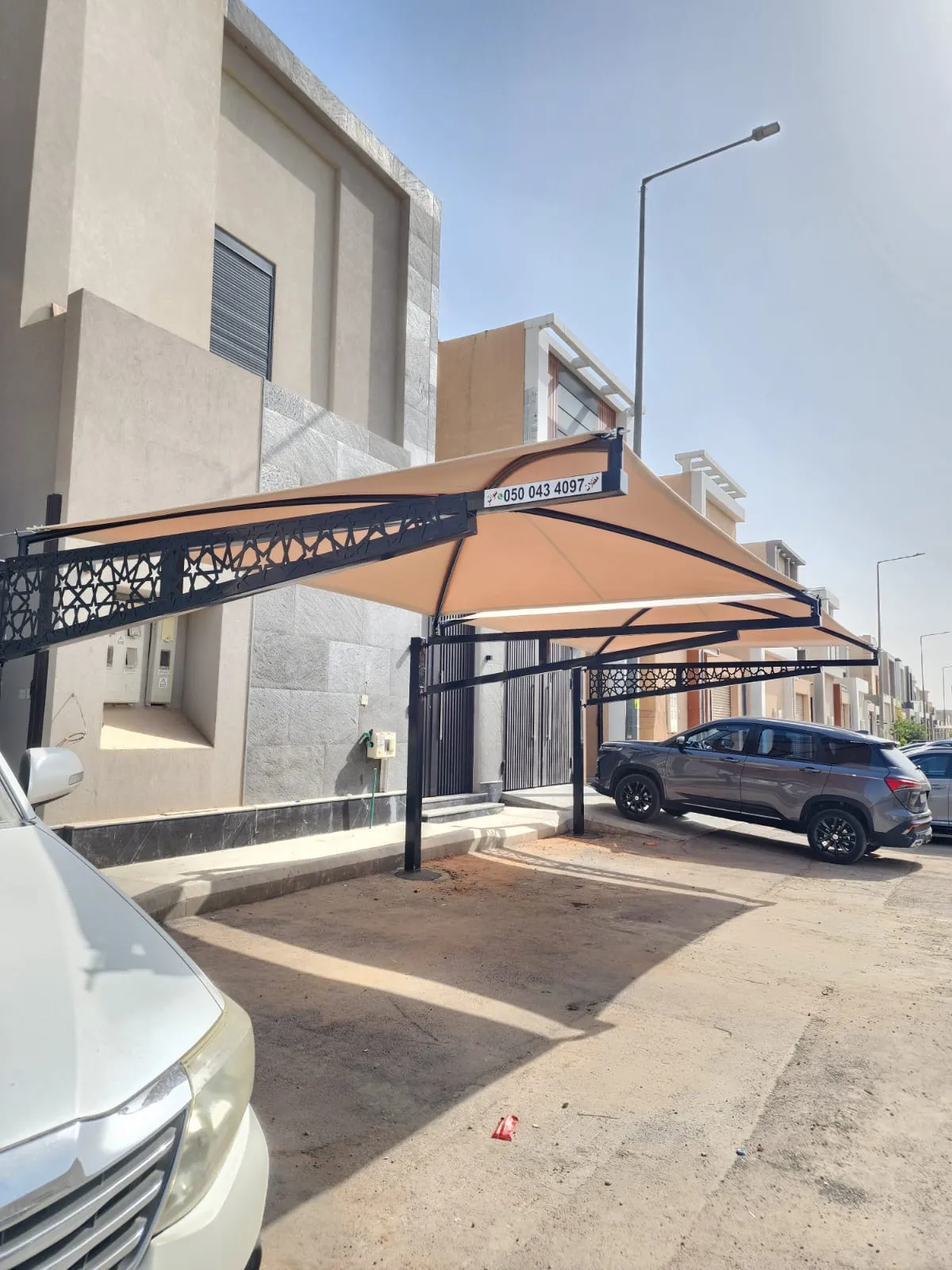 مظلات مواقف شركات ومجمعات حي النخيل